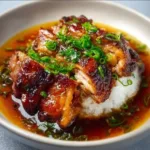 caramelised soy chicken in garlic ginger broth wit 2026 01 12 111550 512x512 1