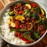 spicy ground beef stir fry bowl with garlic veggie 2026 01 17 125121 512x512 1