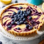 creamy lemon tart with blueberry sauce 2026 03 06 142602 512x452 1