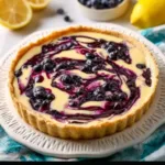 creamy lemon tart with blueberry sauce 2026 03 12 123746 512x512 1