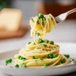 delicious spring pasta with peas and parmesan 2026 03 05 125558 512x512 1