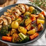 sheet pan lemon herb chicken and vegetables 2026 03 05 125750 512x512 1