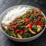 spicy ground beef stir fry bowl with garlic veggie 2026 03 09 115428 512x512 1