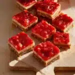 sweet strawberry rhubarb cheesecake bars 2026 03 30 201358 512x512 1