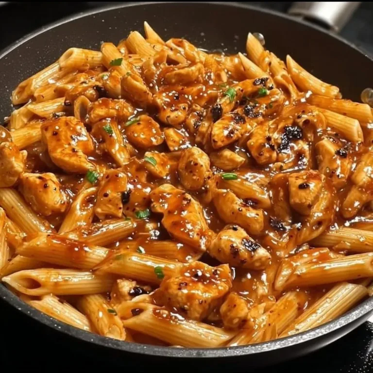 One-Pan Tangy Honey BBQ Chicken Penne dish with rich flavors and vibrant ingredients.