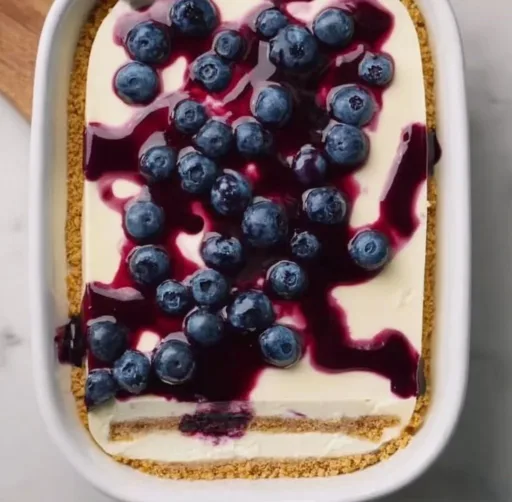 Delicious Blueberry Icebox Cake layered with cream and fresh blueberries