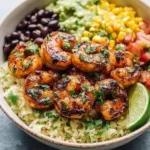 Delicious Chipotle Lime Shrimp dish garnished with fresh ingredients.