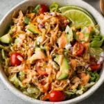Delicious Taco Chicken Salad with fresh ingredients and vibrant toppings.