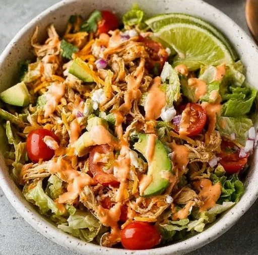 Delicious Taco Chicken Salad with fresh ingredients and vibrant toppings.