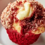 Delicious red velvet cream cheese muffins on a white plate
