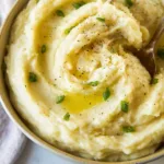 Creamy roasted garlic mashed potatoes served in a bowl